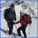 Two happy skiers after a successful descent of Pigne de Arolla